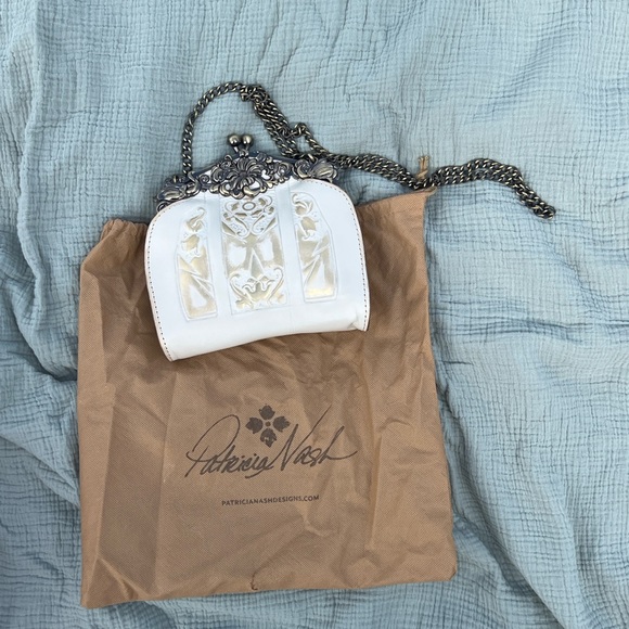 Patricia Nash Handbags - Patricia Nash White and Silver Clutch